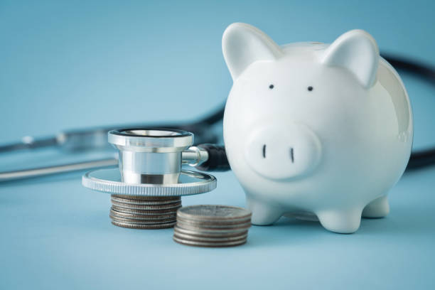 Cost of Healthcare Medical Insurance, Piggy Bank, Stethoscope, Coin Bank, Expense commercial activity stock pictures, royalty-free photos & images