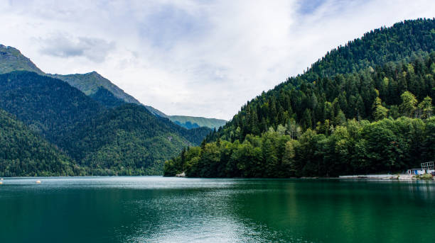 istock Natural landscape with lake Ritsa and beautiful mountains 1170081443