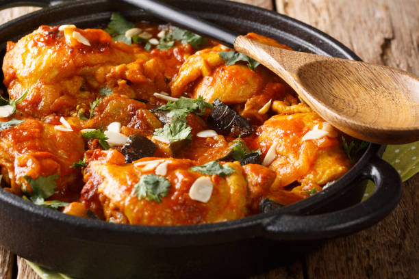istock Chicken with eggplant, almonds with vegetable gravy close-up in a pan. horizontal 1170082767