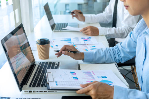 istock businessman in meeting analysis chart graphy 1170082797