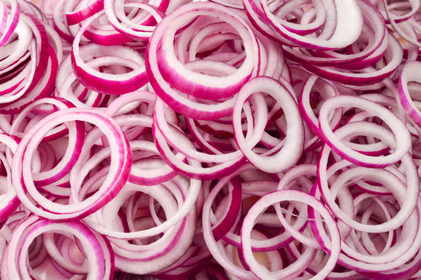 istock Onion rings as a background. Top view. 1170089357
