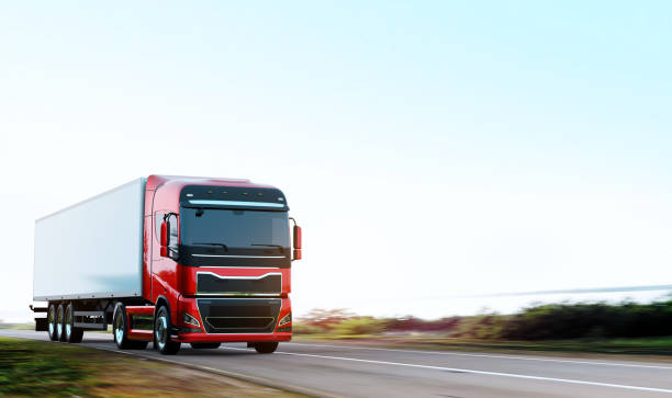 istock semi-truck with trailer driving on road 1170089609