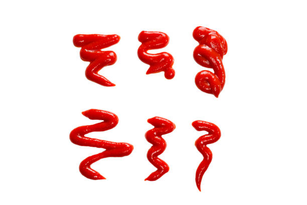 istock Ketchup splashes isolated on white background. 1170090940