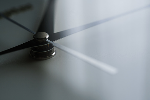 Close up of a clock isolated on dark background
