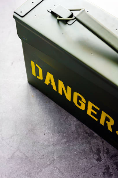 istock Green ammo box isolated on dark background 1170092457