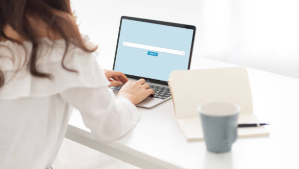 istock Young female freelancer is working on white desk. 1170096262