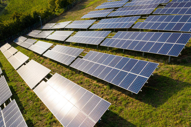 istock Solar panels fields on the green hills 1170097008