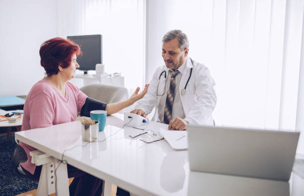 istock Friendly doctor consulting his patient 1170099447