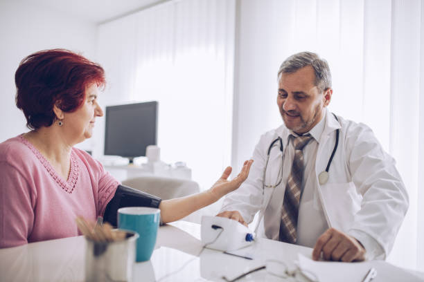istock Friendly doctor consulting his patient 1170099568
