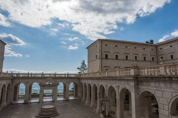 The Abbey of Montecassino is a Benedictine monastery located on the summit of Montecassino, in Lazio. Since December 2014 the site has been managed by the Polo Museale del Lazio. It is the oldest monastery in Italy together with the monastery of Santa Scolastica. It rises 516 metres above sea level.