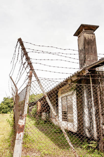 Old abandoned tin mine. Old abandoned tin mine in Takua Pa, Phang Nga, the district was an important tin-dredging area in the first half of the twentieth century in Thailand. barbed wire wire factory sky stock pictures, royalty-free photos & images