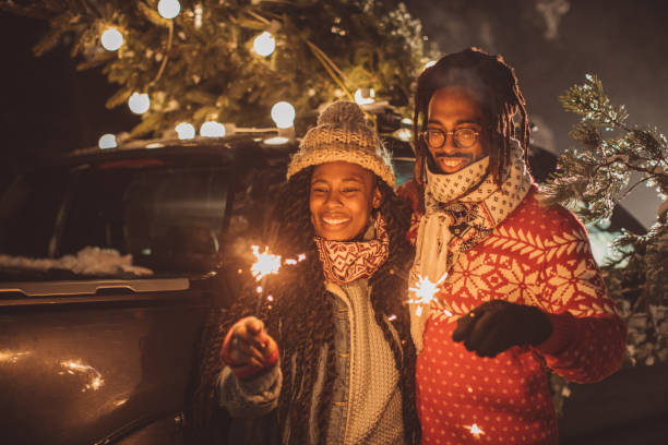 istock Perfect Christmas tree arrival celebrated with sparklers 1170106202