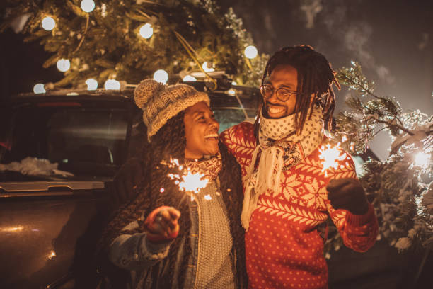 istock Perfect Christmas tree arrival celebrated with sparklers 1170106270