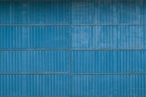 istock Blue metal gate from the garage.metallic ,gate texture,vertical texture 1170106533
