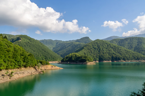 Part of unspoilt natural view around Lago ie Lake Vagli in Garfagnana, province of Lucca, Italy, near Vagli Sotto village. It is, however, a man-made reservoir for hydrelectric power..