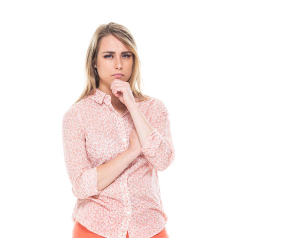 istock Beautiful caucasian female wearing orange clothes - thinking 1170114971