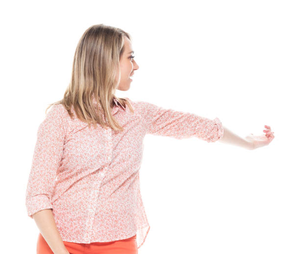 istock Beautiful female showing / pointing 1170115078