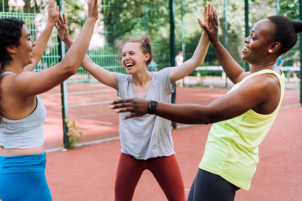 istock Female basketball team celebrating a win 1170115083