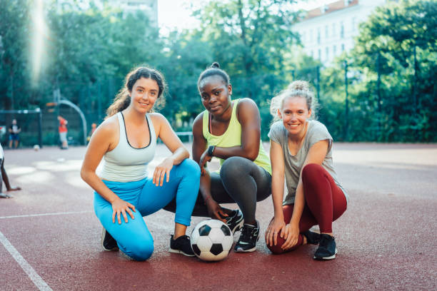 istock Multi-ethnic female football players 1170115507
