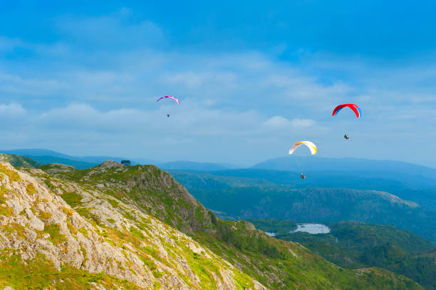 BERGEN, NORWAY - AUGUST 4, 2019: Beautiful landscape with paragliders seen from the Mount Ulriken in Bergen