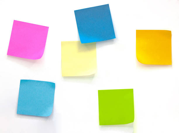 istock Collection of different colored sheets of note papers Isolated on white background 1170117048