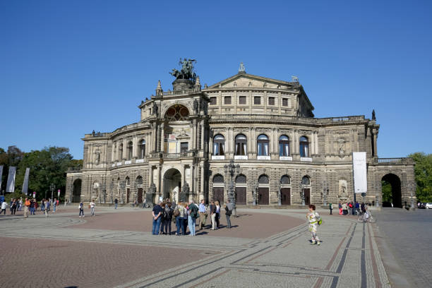 semperoper, the opera house in dresden. dresden is a city located in the eastern part of germany and it is the capital of the state of saxony. - opera house semper opera house statue theaterplatz imagens e fotografias de stock