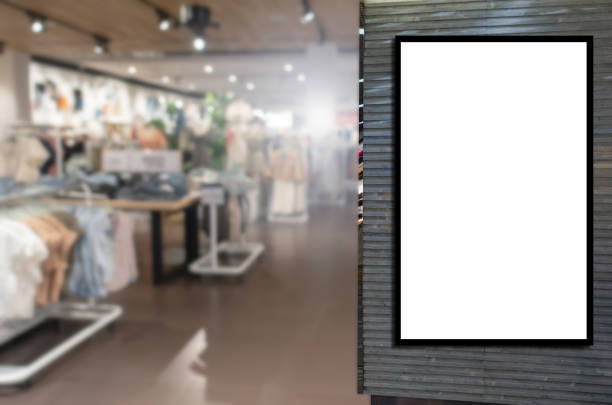 istock advertising light box or blank showcase billboard for your text message or media content with blurred image popular women fashion clothes shop showcase in shopping mall, commercial, marketing concept 1170121993
