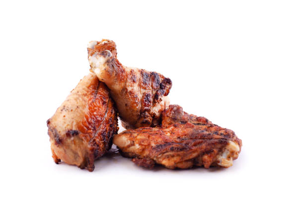 istock grilled orange chicken legs on a white background isolated 1170124360