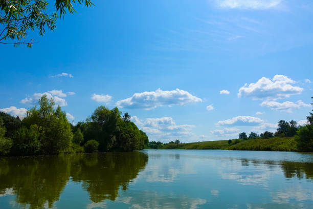 istock Lake with reflecting clouds. Summer time. Russia 1170124659