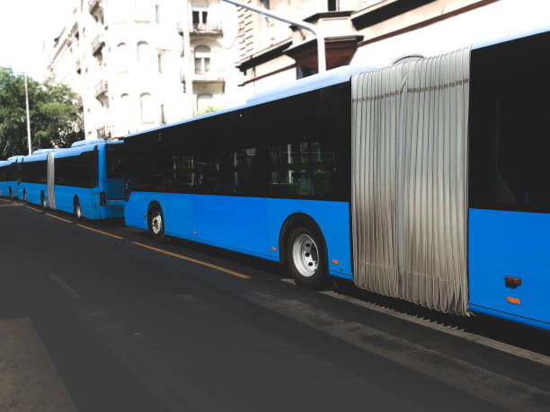 istock Line of empty buses waiting for passngers on empty road 1170124993