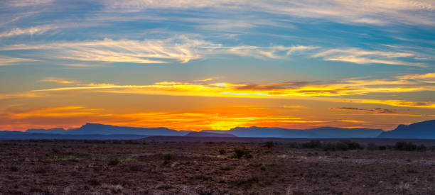istock Sunset color the clouds yellow and the mountains blue 1170129836