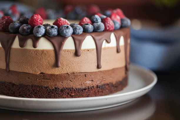 istock Fresh beautiful chocolate cake with fruit and berry 1170130941