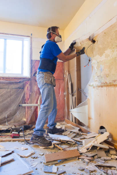 istock Man Tearing Out a Wall During Home Renovations 1170131032