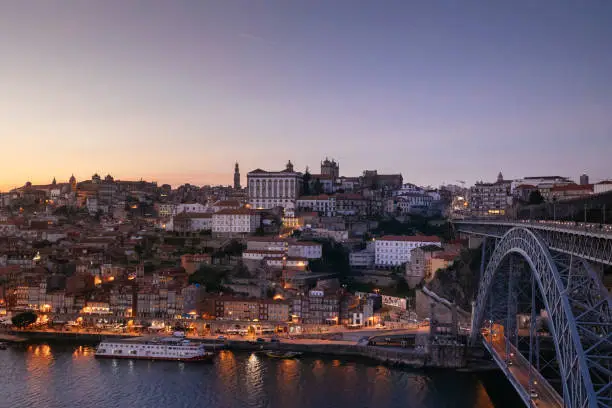 Photo of Night view of the douro river with boats. European city. Travel lifestyle.