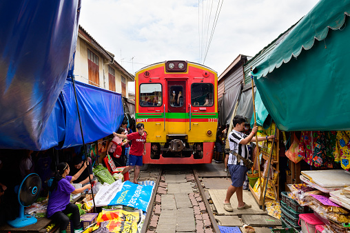 Samut Songkhram, Thailand - August 24, 2019 : Maeklong railway market or Mae Klong market.