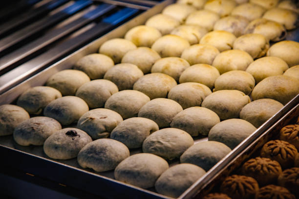 Turkish Traditional Dessert of Chocolate Bomb Cookie from Izmir, Turkey Turkish traditional dessert izmir bomb cookie - Atom bomba tatlısı with melted chocolate cream in hot oven  from Alsancak, Izmir, Turkiye chocolate white chocolate chocolate chip white stock pictures, royalty-free photos & images