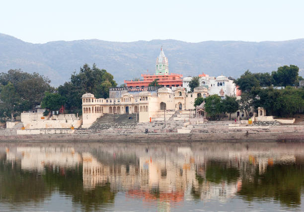 Ancient hindu temple on Ghat in Pushkar, Rajasthan, India. It is located in Ajmer district of the Rajasthan state. Pushkar Lake is a sacred lake of the Hindus and Sikhs.