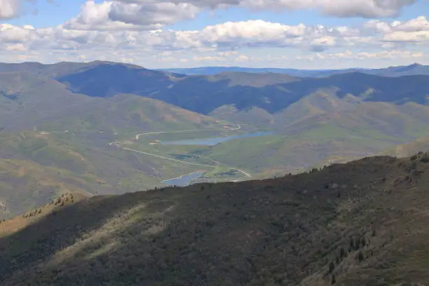 View of the Wasatch Mountains, valleys dotted with lakes in late spring.