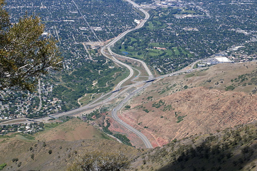 I-80 going west leaves Parleys Canyon in the Wasatch Mountains and enters downtown Salt Lake City