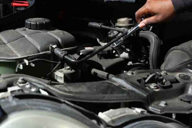 istock someone under the hood fixing a car 1170151853
