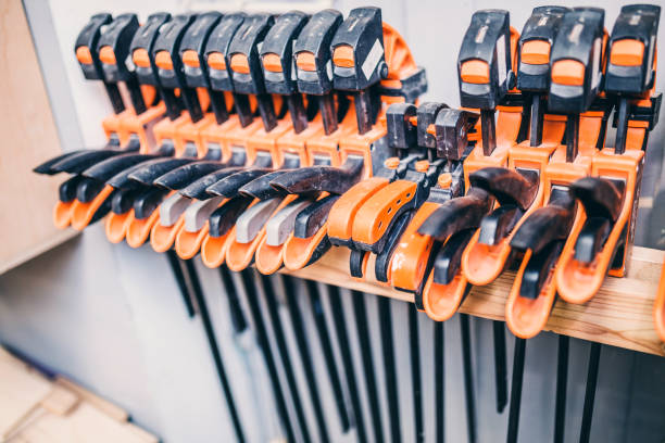 istock Carpentry workshop - a large set of clamps 1170152412