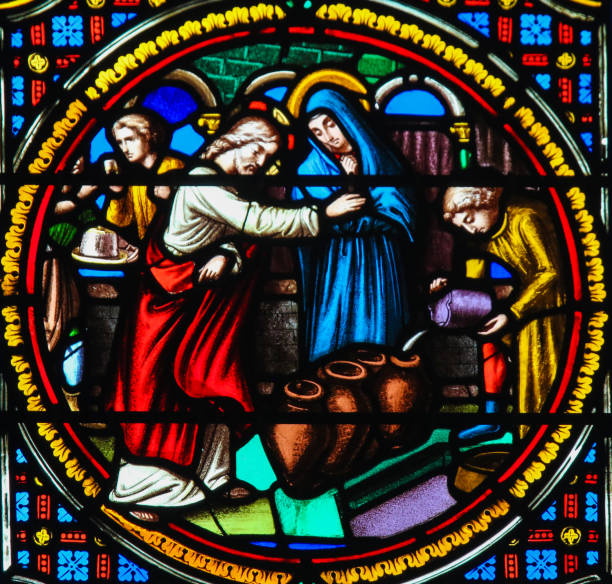 Stained Glass in Notre-Dame-des-flots, Le Havre - Wedding at Cana Stained Glass in the Chapel of Notre-Dame-des-flots (1857) in Sainte Adresse, Le Havre, France, depicting Jesus transforming water into wine at the Marriage at Cana allegory painting stock pictures, royalty-free photos & images