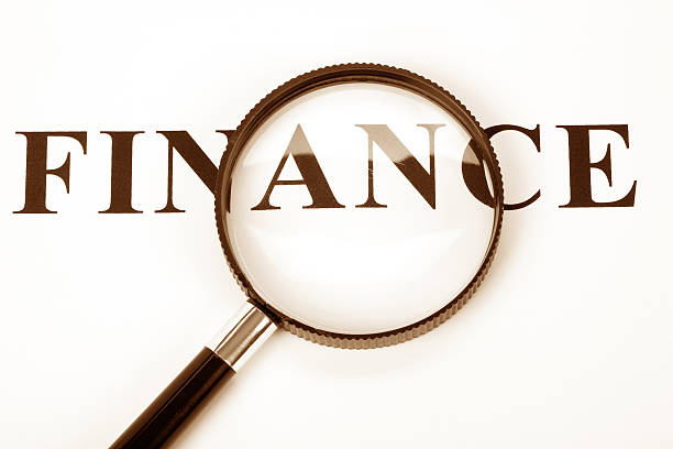 istock headline finance and magnifier 117015344