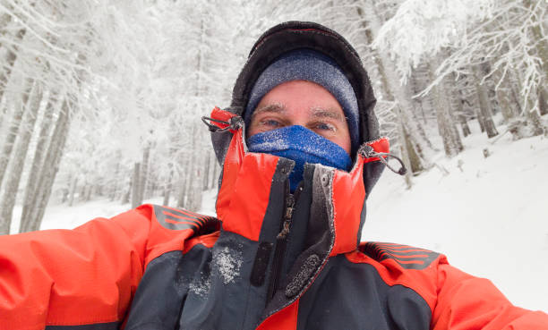 istock man taking a selfie in winter scene 1170153567