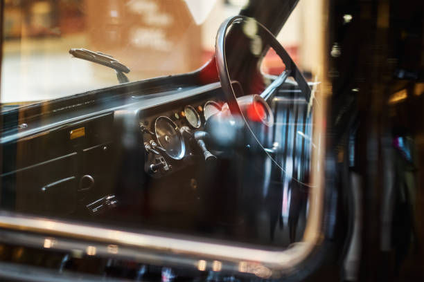 istock Close up headlight of a black vintage car 1170153583