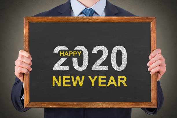 istock Happy New Year 2020 on Chalkboard Background 1170154574