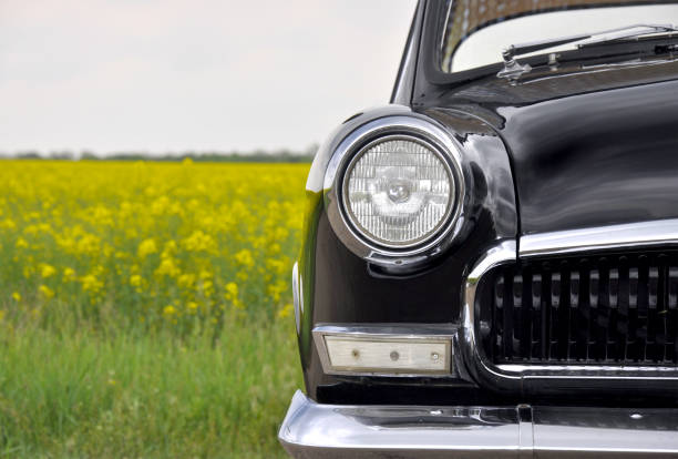 Old vintage black car outdoors.