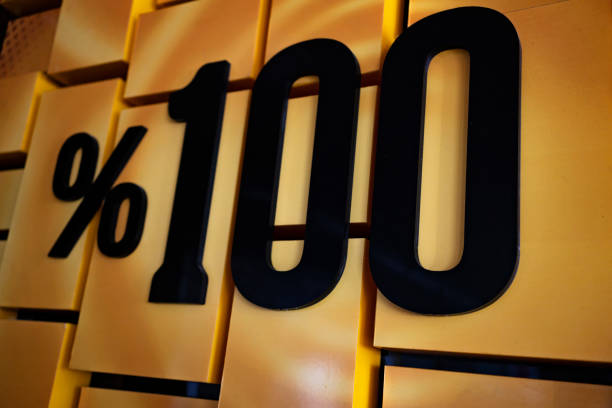 100% Hundred Percent Sign on wall.