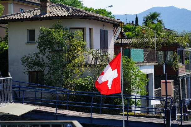 istock Swiss flag on a sunny day 1170170478