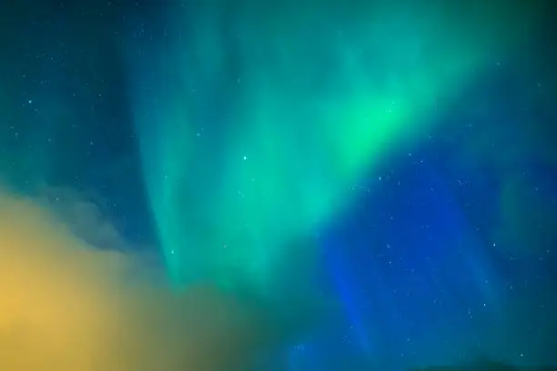 Photo of Amazing and Unique Nothern Lights Aurora Borealis Over Lofoten Islands in Norway, Over the Polar Circle. Horizontal Shot